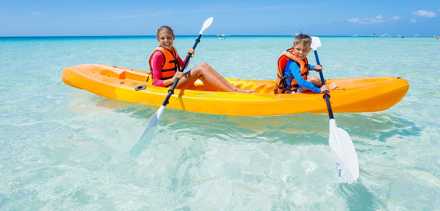 two kids in a kayak